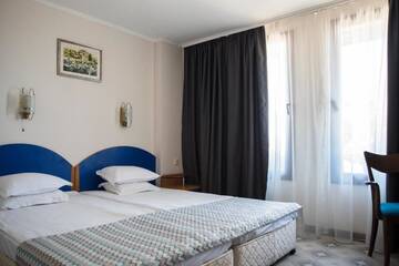 Фото номера Двухместный номер с 1 кроватью или 2 отдельными кроватями Отель Victoria Hotel Nessebar г. Несебр 10