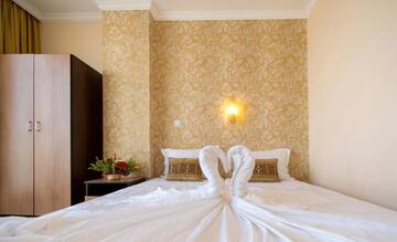 Фото номера Люкс с 1 спальней и балконом (для 4 взрослых) Отель Hotel Iris г. Несебр 5